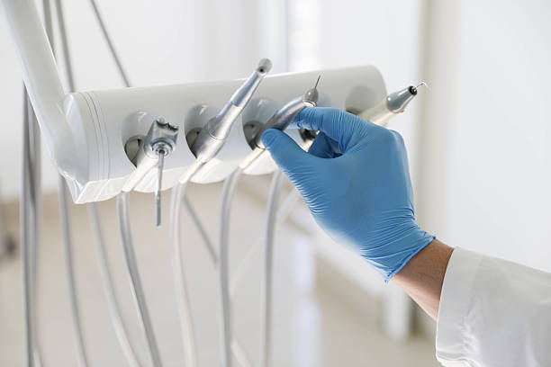 Professional Tooth Extraction technician working in Charleston, IL